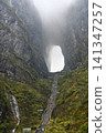 999-steps staircase to the huge arch of the 'Heavenly Gate' in the fog in the Tianmenshan Mountains 141347257