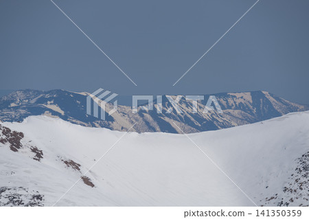 Snow-capped plateaus and mountains shrouded in spring mist. Snow-capped plateaus and mountains shrouded in spring mist. 141350359