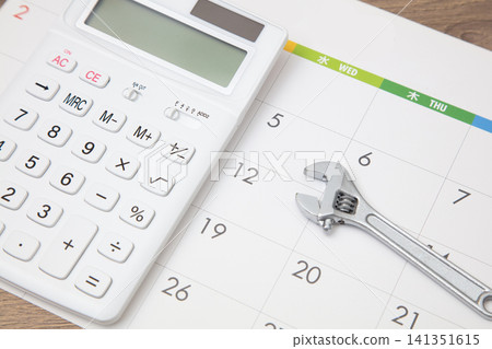 Wrench and calculator calendar background 141351615