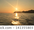 The sunset over the Seto Inland Sea and a path of golden light 141355803