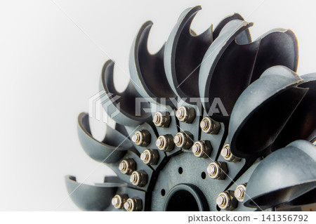 Industrial Turbine Wheel Close-Up with Metal Blades and Bolts Industrial Turbine Wheel Close-Up with Metal Blades and Bolts 141356792