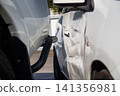 Car accident damage after collision on urban road 141356981