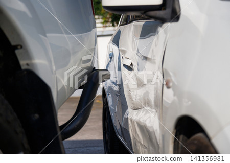 Car accident damage after collision on urban road Car accident damage after collision on urban road 141356981
