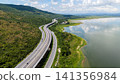 Drone shot The M6 motorway Nakhon Ratchasima Province - Bang Pa-in Lam Ta Khong River and Mountain. Motorway Korat Thailand 141356984