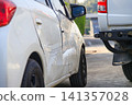 Car accident damage after collision on urban road 141357028