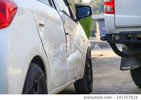 Car accident damage after collision on urban road Car accident damage after collision on urban road 141357028