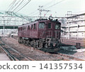 An EF15 electric locomotive (No. 196) parked in the premises of Omiya Station during the Japanese National Railways era. 141357534