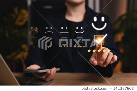 Customer review satisfaction feedback survey concept. User selects five-star rating on virtual interface, showcasing customer satisfaction, feedback and survey evaluation in internet networking. 141357608