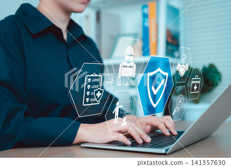 Work safety and compliance concept. A person using a laptop with digital icons representing work safety, compliance, regulations, and professional standards, symbolizing secure workplace practices. Work safety and compliance concept. A person using a laptop with digital icons representing work safety, compliance, regulations, and professional standards, symbolizing secure workplace practices. 141357630
