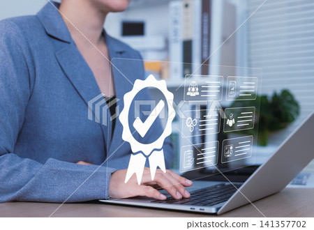 Quality Assurance and Certification Compliance Concept. Businesswoman using laptop with icons representing quality assurance, certification, compliance standards, and performance assessment. ISO, Quality Assurance and Certification Compliance Concept. Businesswoman using laptop with icons representing quality assurance, certification, compliance standards, and performance assessment. ISO, 141357702