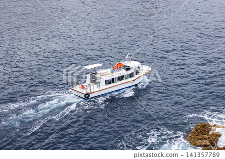 Scenic spots on Sado Island, the scenery of Senkaku Bay and sightseeing boats Scenic spots on Sado Island, the scenery of Senkaku Bay and sightseeing boats 141357789