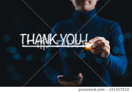 Thank You Message and Business Appreciation Concept. Woman draws text THANK YOU! in air, representing gratitude, congratulations, and professional appreciation in business or customer service context. Thank You Message and Business Appreciation Concept. Woman draws text THANK YOU! in air, representing gratitude, congratulations, and professional appreciation in business or customer service context. 141357819