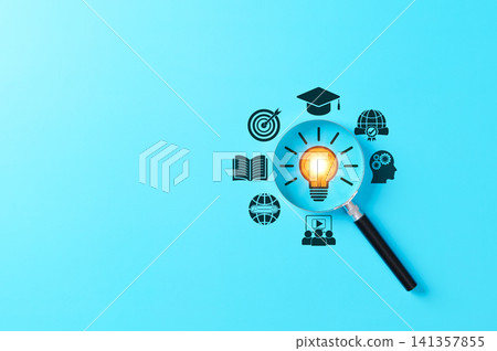 Education and innovation concept, magnifying glass focusing on a lightbulb with icons of learning, goals, skills, and global knowledge, representing research, creative thinking, academic development, Education and innovation concept, magnifying glass focusing on a lightbulb with icons of learning, goals, skills, and global knowledge, representing research, creative thinking, academic development, 141357855