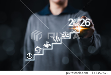 Business strategy and growth roadmap concept with person pointing at 2026, visualizing success steps from startup to achievement using icons for planning, teamwork, process and successful goals. Business strategy and growth roadmap concept with person pointing at 2026, visualizing success steps from startup to achievement using icons for planning, teamwork, process and successful goals. 141357879