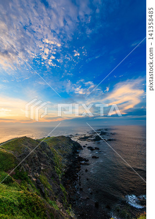 The cape of Hokkaido, which evokes the power of nature, and the beautiful gradient of the sunrise. The cape of Hokkaido, which evokes the power of nature, and the beautiful gradient of the sunrise. 141358485