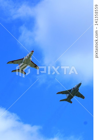 Air Self-Defense Force training aircraft and fighter jets taking off Air Self-Defense Force training aircraft and fighter jets taking off 141358559