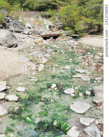 Gunma Prefecture, Nishinokawara Park, a river with a flowing hot spring, May. Gunma Prefecture, Nishinokawara Park, a river with a flowing hot spring, May. 141359093