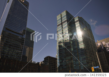 Sun Flare Between Twin Glass Towers Toronto Canada Sun Flare Between Twin Glass Towers Toronto Canada 141359323
