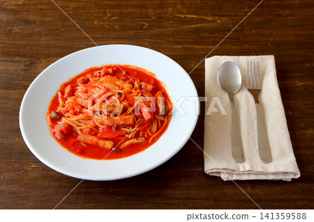 Tomato soup pasta in the background of the table Tomato soup pasta in the background of the table 141359588