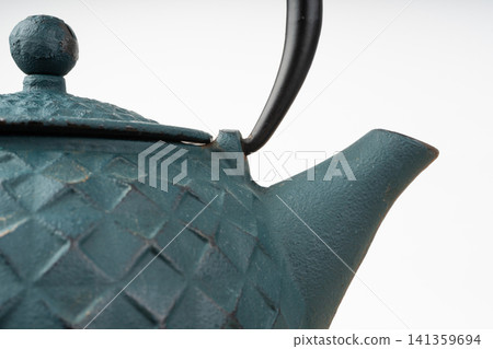 Antique iron teapot. Chinese dark green kettle, metal heavy Japanese tea pot Antique iron teapot. Chinese dark green kettle, metal heavy Japanese tea pot 141359694
