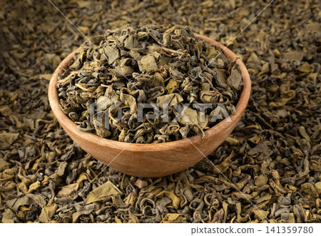 Green tea leaves macro textured background Green tea leaves macro textured background 141359780