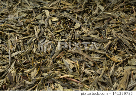 Green tea leaves macro textured background Green tea leaves macro textured background 141359785