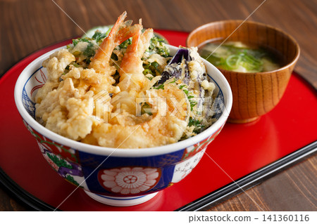 Bowl of rice and fried fish Bowl of rice and fried fish 141360116