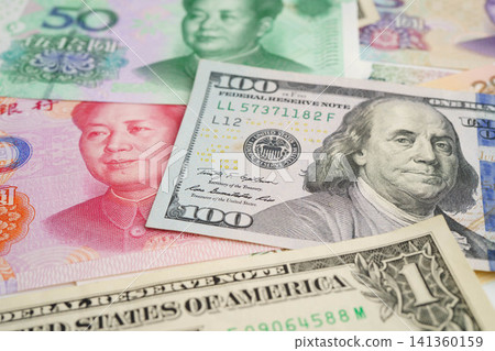 China yuan and dollar banknote money, investment economy business and banking. China yuan and dollar banknote money, investment economy business and banking. 141360159