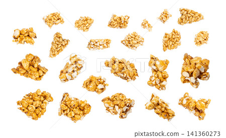 Puffed rice bar isolated, sweet wheat kozinaki, puff cereal block pieces, sugar crispy wheat bar, healthy popped dessert Puffed rice bar isolated, sweet wheat kozinaki, puff cereal block pieces, sugar crispy wheat bar, healthy popped dessert 141360273
