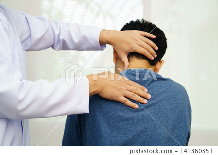 Physical therapy, Asian therapist doctor treat perform pain therapy in hospital. Physical therapy, Asian therapist doctor treat perform pain therapy in hospital. 141360351