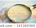 Bangkok, Thailand  May 15, 2022 Magnifying glass on world map. 141360360