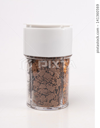 Chocolate Sprinkle Packaging Box Isolated, Candy Sprinkles Flakes, Sweet Flakes Glaze Decoration Chocolate Sprinkle Packaging Box Isolated, Candy Sprinkles Flakes, Sweet Flakes Glaze Decoration 141360569