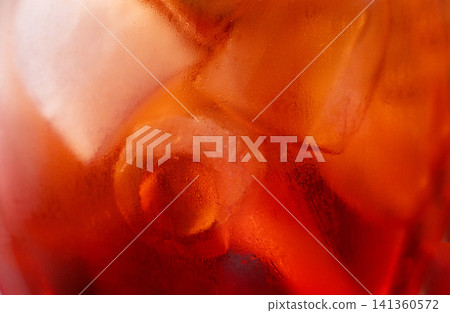 Aperol spritz cocktail closeup, summer orange alcohol drink in glass Aperol spritz cocktail closeup, summer orange alcohol drink in glass 141360572