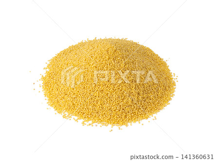 Raw millet grains pile isolated. Little yellow cereal, natural foxtail small seeds Raw millet grains pile isolated. Little yellow cereal, natural foxtail small seeds 141360631
