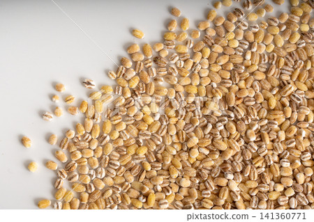 Pearl barley grains textured background Pearl barley grains textured background 141360771