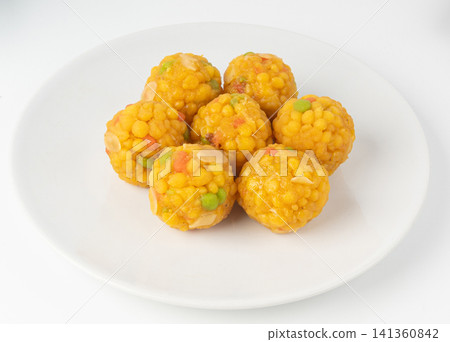 Ladoo, laddu or bundi laddoo is Indian sweet Diwali food. This is boondi ladoo balls Ladoo, laddu or bundi laddoo is Indian sweet Diwali food. This is boondi ladoo balls 141360842