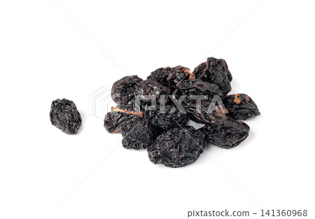 Dry Plums Isolated, Dried Black Fruits Pile Dry Plums Isolated, Dried Black Fruits Pile 141360968