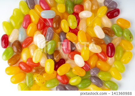 Jelly beans gummy candy pile, colorful marmalade pills Jelly beans gummy candy pile, colorful marmalade pills 141360988
