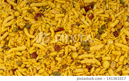 Khatta meetha namkeen textured background Khatta meetha namkeen textured background 141361017
