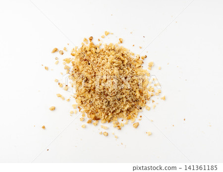 Grated wallnut , broken roasted walnuts, heap of nuts crumbs, whole kernel pieces, fractions Grated wallnut , broken roasted walnuts, heap of nuts crumbs, whole kernel pieces, fractions 141361185