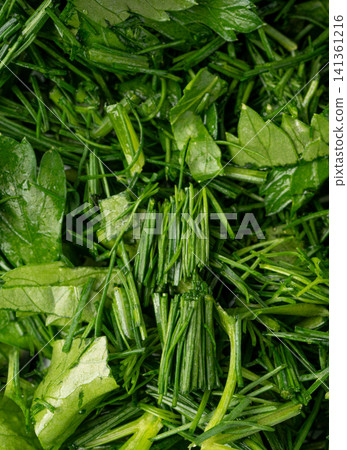 Fresh chopped herbs textured background Fresh chopped herbs textured background 141361216