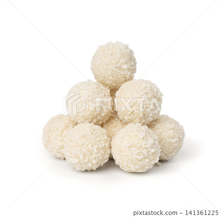 Coconut candies isolated, coco balls set. White truffle ball, indian ladoo or laddu with sweet cream Coconut candies isolated, coco balls set. White truffle ball, indian ladoo or laddu with sweet cream 141361225