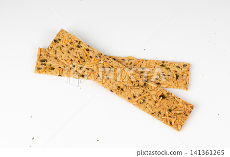 Crunchy gluten free crispbread with various seeds top view Crunchy gluten free crispbread with various seeds top view 141361265