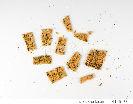 Crunchy gluten free crispbread with various seeds top view Crunchy gluten free crispbread with various seeds top view 141361271