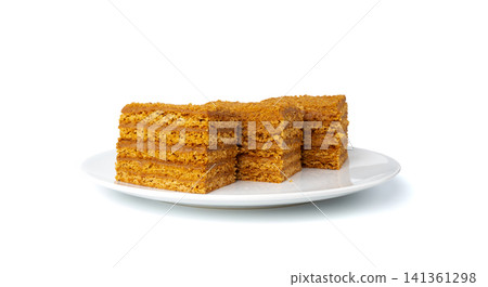Honey cake isolated, medovik dessert piece Honey cake isolated, medovik dessert piece 141361298
