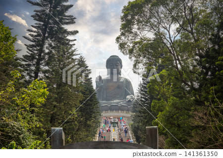 Big Buddha Statue in Hong Kong and the Staircase Through the Green Park Big Buddha Statue in Hong Kong and the Staircase Through the Green Park 141361350