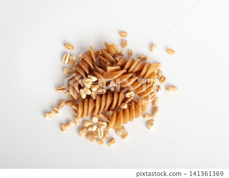 Raw Brown Pasta, Wholegrain Fusilli, Dry Whole Grain Noodle, Raw Spelt Macaroni, Healthy Italy Food Raw Brown Pasta, Wholegrain Fusilli, Dry Whole Grain Noodle, Raw Spelt Macaroni, Healthy Italy Food 141361369