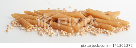 Raw Brown Pasta, Wholegrain Penne, Dry Whole Grain Noodle, Raw Spelt Macaroni, Healthy Italy Food Raw Brown Pasta, Wholegrain Penne, Dry Whole Grain Noodle, Raw Spelt Macaroni, Healthy Italy Food 141361373