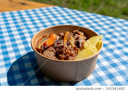 Korean beef bulgogi in paper bowl Korean beef bulgogi in paper bowl 141361402