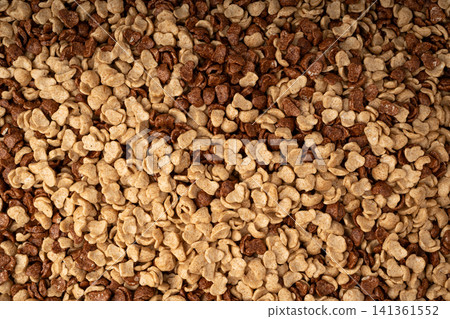 Chocolate cereal flakes texture background, rice crispy breakfast pattern Chocolate cereal flakes texture background, rice crispy breakfast pattern 141361552